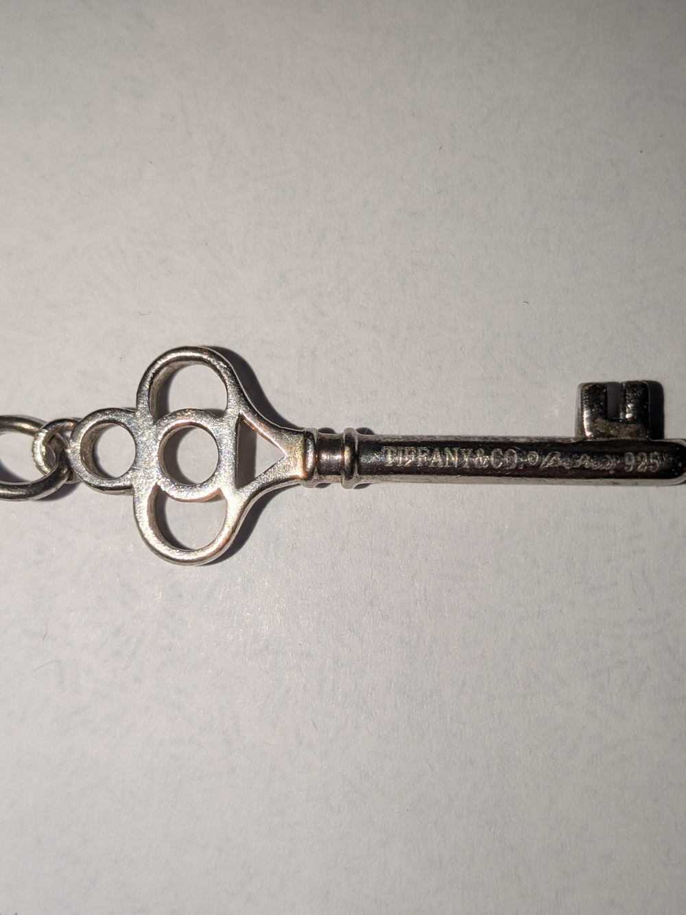 Authentic Tiffany & Co. Sterling Silver Crown Key Pendant
